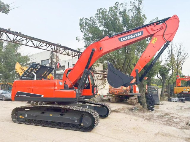 Is $31,000 a Fair Price for a Used Doosan DX225LCA Excavator with 1,800 Hours?